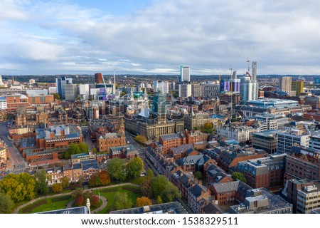 Aerial photo of the Leeds town centre in the UK showing the Leeds Town Hall with construction work being done on the tower