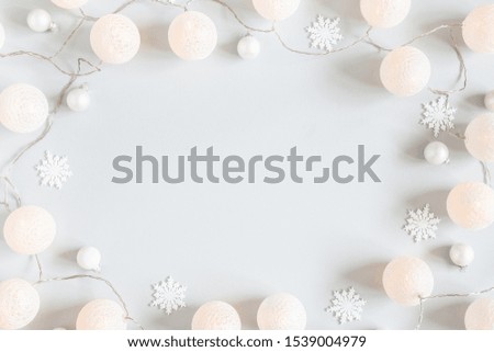 Christmas composition. Garland, christmas decorations on gray background. Christmas, winter concept. Flat lay, top view, copy space