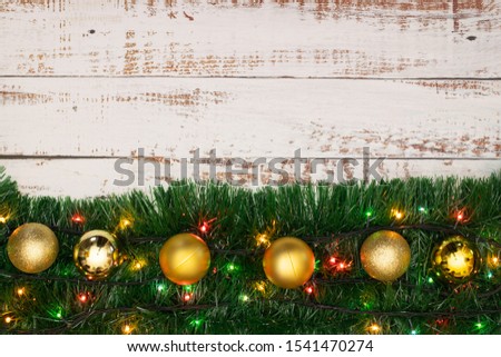 Christmas decoration on the table with gold ornaments 