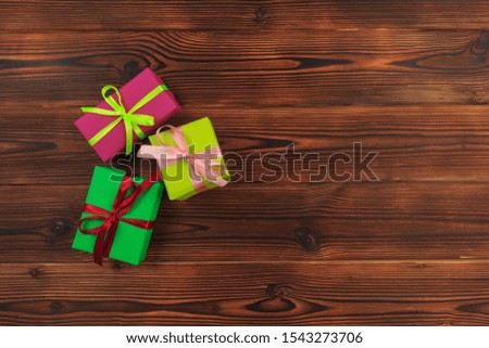 gift box on a wooden background top view. - Image 