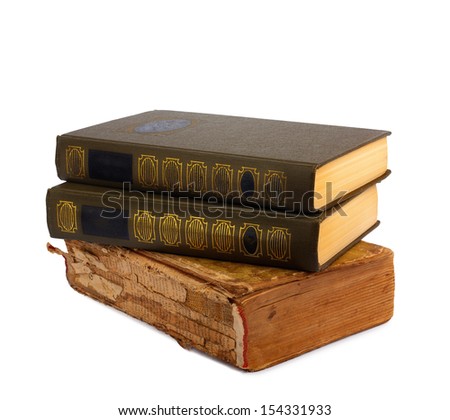 A stack of old books with gold stamping on a white background isolated
