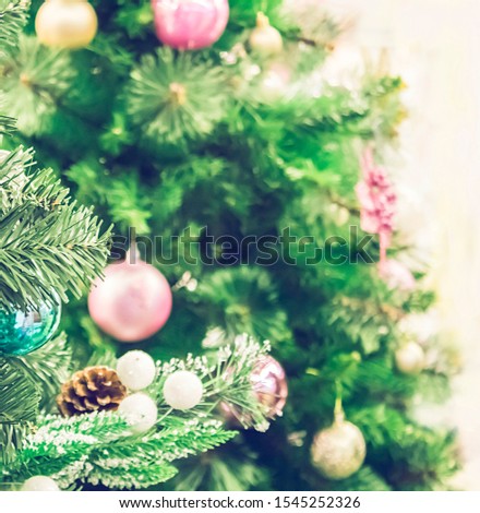 Christmas decorations on Christmas tree, holiday background.