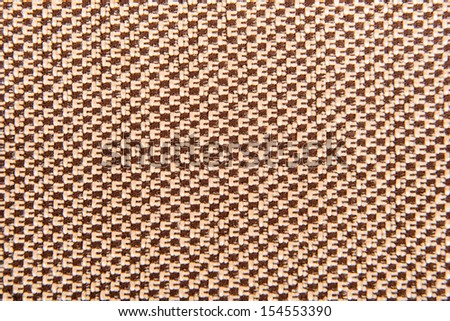 brown fabric texture. Clothes background. Close up 