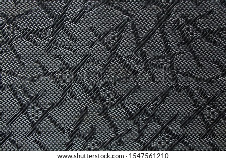 
Gray-black background with a chaotic pattern.