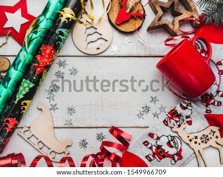 Beautiful card with Christmas decorations. View from above, close-up, flat lay.
