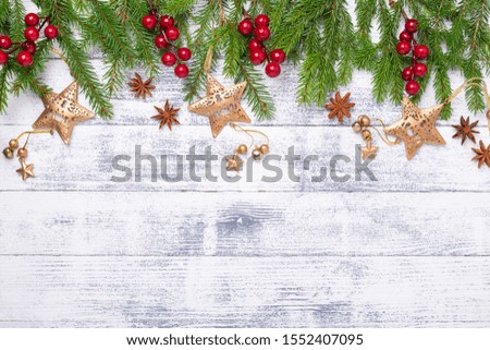 Christmas fir tree and gifts on wooden background. Top view Copy space - Image