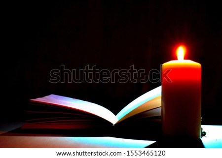 Religious diary for prayers. Magical paper romance in the dark. Prayer to God.