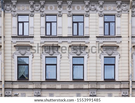 Beaux-Arts architecture  classical facade building front view close up. The abundance of architectural decorations