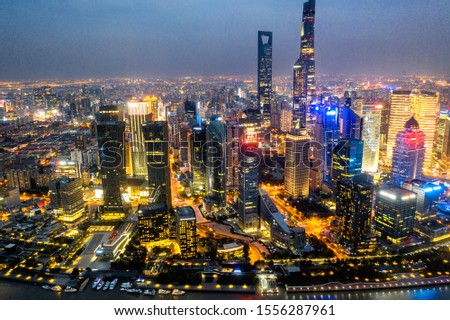 shanghai skyline panorama in sunset, pudong financial center with huangpu river, China