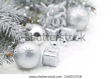 Christmas decoration with fir branch,silver Christmas ball and gift box