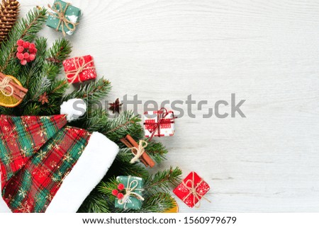 Christmas card. Gift boxes, Christmas tree and Christmas decorations on a white background. Top view.