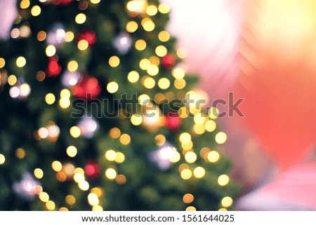 Christmas tree background, image blur colorful bokeh lights 