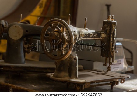 Old rusty vintage sewing machine