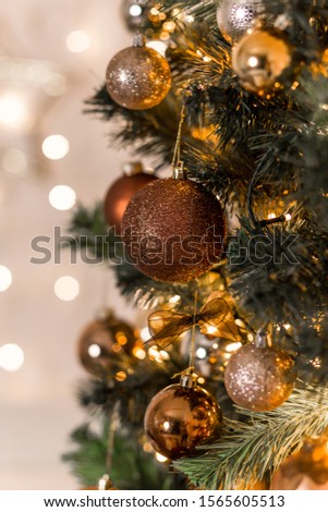 Christmas tree with brown and golden balls