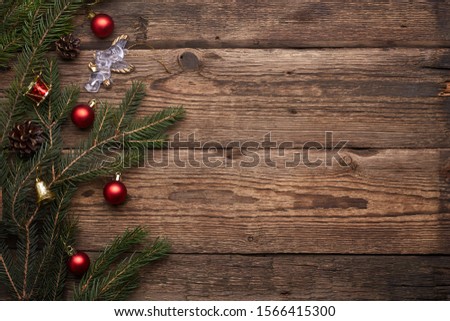 Christmas or New Year decoration background. Little angel. Brown grunge background with copy space.