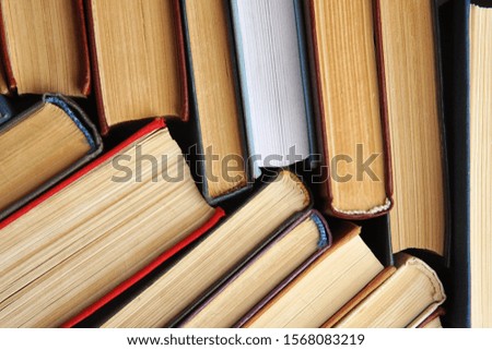 Many different hardcover books as background, top view