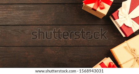 brown wooden desk with colorful presents