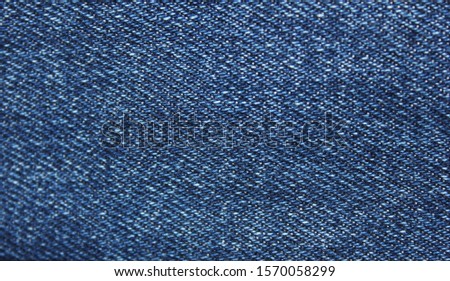 Blue jeans texture background. Empty jean fabric, simple denim cloth canvas, horizontal jeans surface close up view 