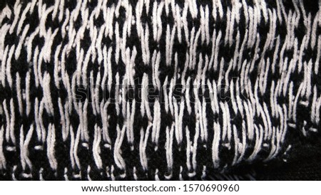 Abstract Black and white woolen background and texture. 