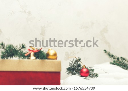 Christmas decoration on a white background Red ball and pine