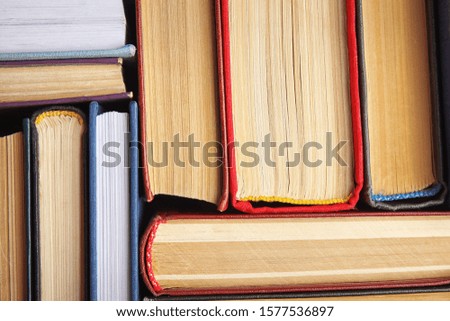 Many different hardcover books as background, top view