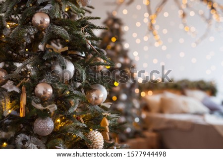 Christmas tree and gifts close up