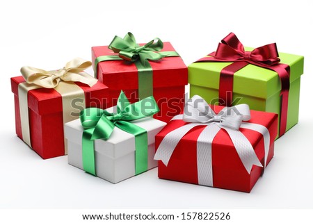 Bright gifts with bows on white background