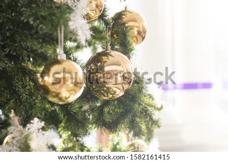 gold ball on christmas tree