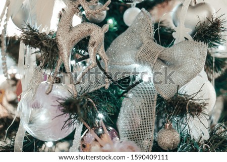 Decorated Christmas tree on background.