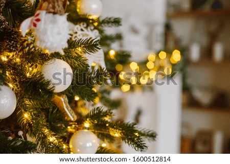 Blurred texture with christmas balls on the Christmas tree
