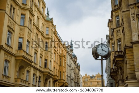 city view with clock in Prague