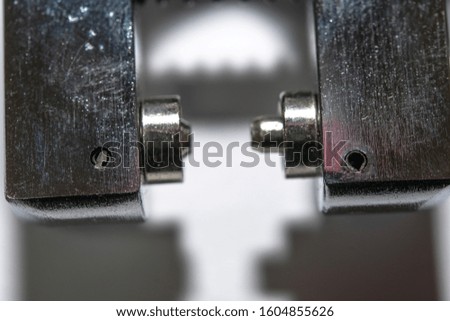 Riveting pliers close up on white ground