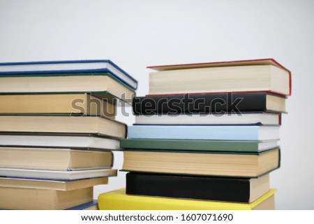 Books on table with white background