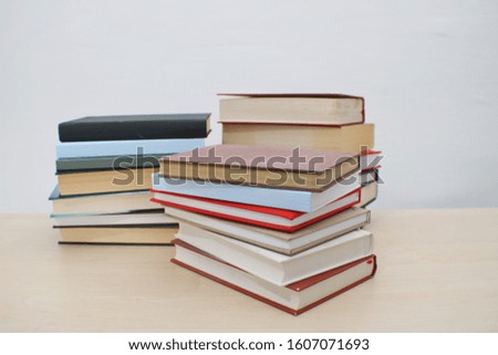 Books on table with white background
