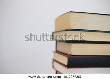 Books on the table with white background