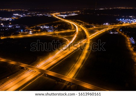 
Aerial view of the night freeway with intersections, bridges and viaducts.