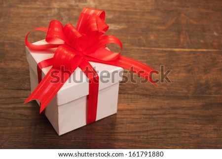 Gift on wooden background