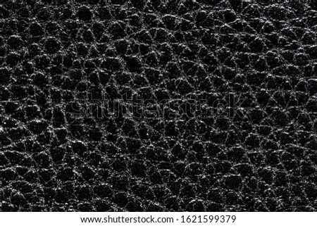 Black natural leather texture. Abstract background for design.