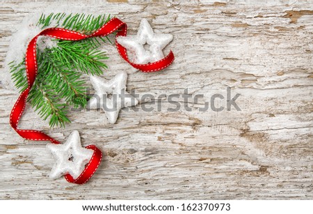 Christmas background with fir branch and red ribbon 