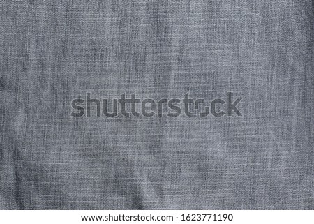 The texture of the denim material is the view on top background