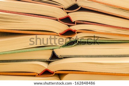pile of open books