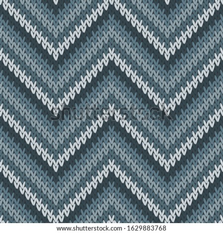 Fluffy zigzag chevron stripes knitted texture geometric seamless pattern. Rug knit effect ornament. Winter seamless knitted pattern. Winter holidays wallpaper.