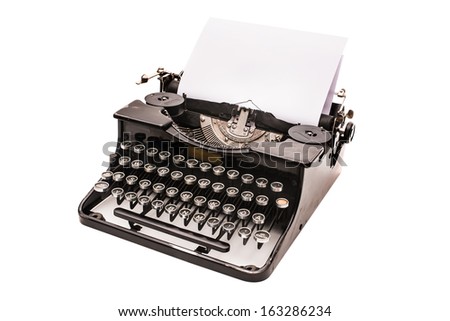 Vintage typewriter with paper sheet isolated on white