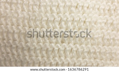 White knitted texture, background. Fashion pattern modern, backdrop surface photo 