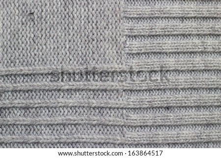Grey knitting wool texture background