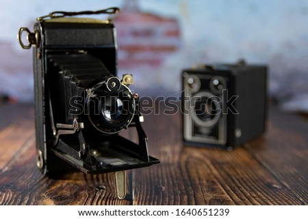 Still life with nostalgic and Box  cameras Timeless photography Variety of old antique cameras.