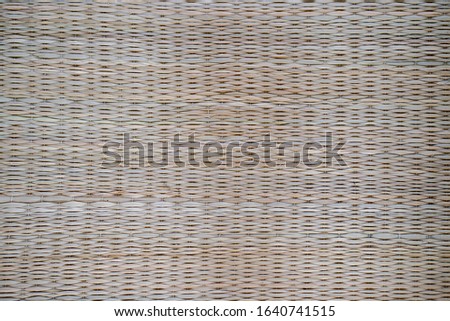 Textured wooden mat for background.
