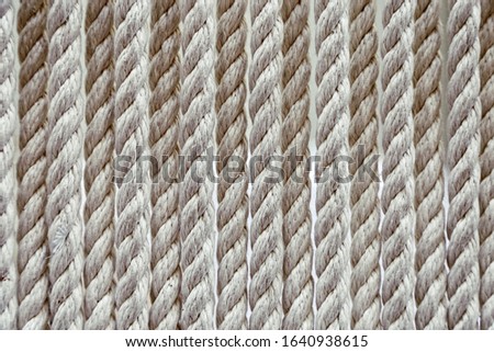 Background from thick ropes made fibers, braided ropes. 