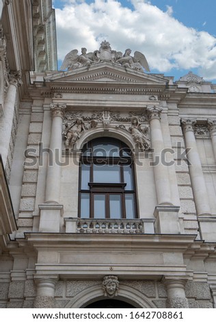 Detail of the facade of historic Burgtheater (Imperial Court Theatre) and famous Wiener Ringstrasse in Vienna, Austria