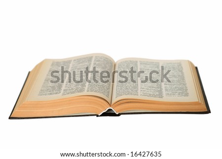 Open old book isolated on a white background